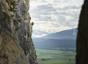 Austria, Tyrol, two rock climbers in Martinswand - CVF00755