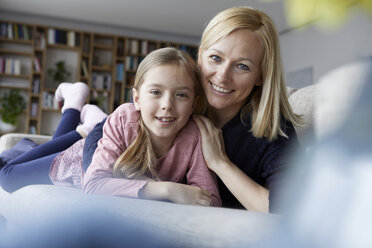 Mother and daughter having fun at home - RBF06274