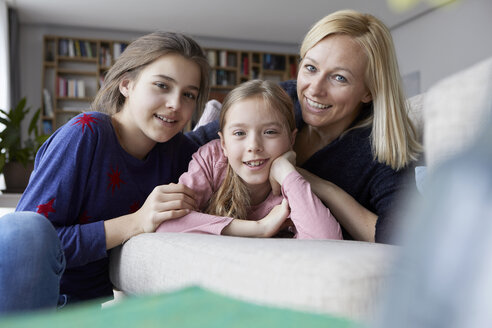 Mother and daughters having fun at home - RBF06275