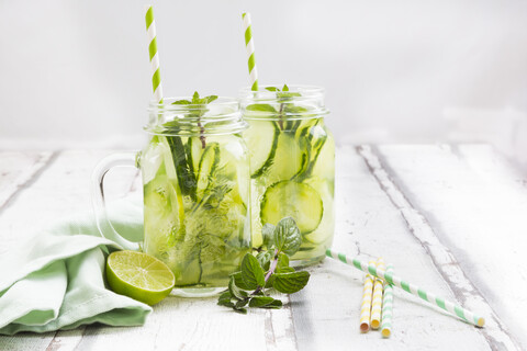 Organic cucumber water with mint and lime stock photo