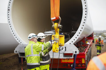 Engineers working on wind turbine - CUF28479