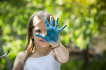 Girl's blue painted hand - LVF07081