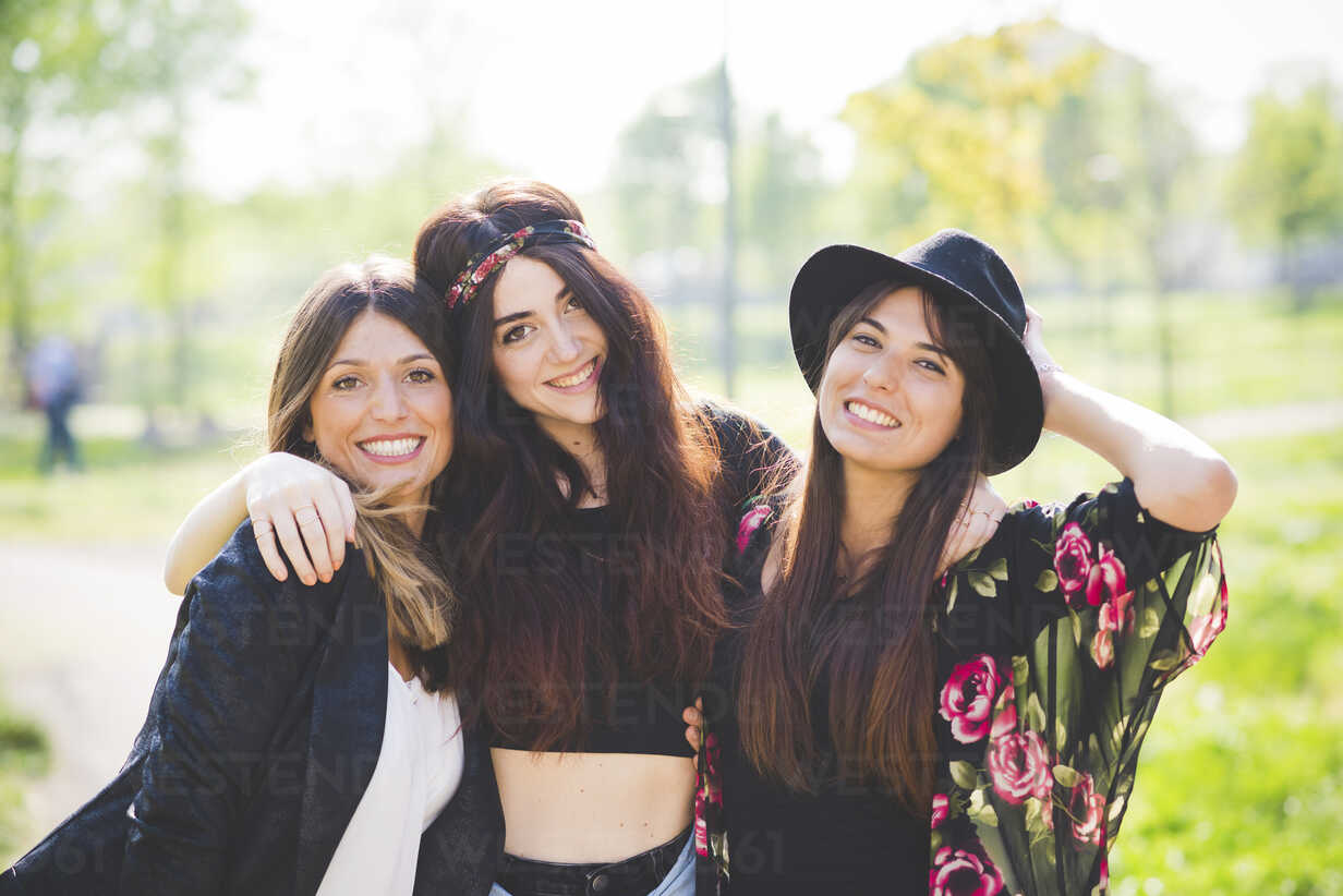 Group portrait of diverse young women wearing clothes in hipster