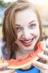 Young woman eating watermelon - CUF30888