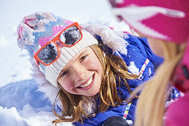 Mother and daughter playing in snow, Chamonix, France - CUF31291