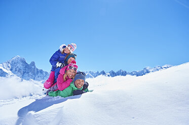 Family playing in snow, Chamonix, France - CUF31293