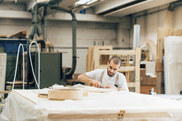 Carpenter at work in workshop - CUF31722