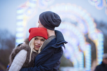 Romantic young couple at xmas festival in Hyde Park, London, UK - CUF31762