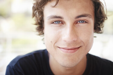 Close up portrait of young man with blue eyes - CUF32154