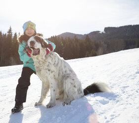 Girl bonding with her pet dog - ISF10029