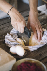 Raw pasta dough in kitchen towel, dough scraper - ALBF00496