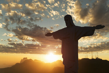 Silhouette at sunset of Christ the Redeemer statue, Rio De Janeiro, Brazil - CUF32485