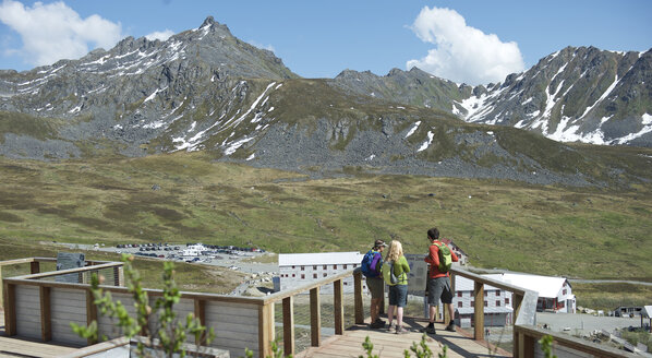 Hikers exploring, Hatcher Pass, Matanuska Valley, Palmer, Alaska, USA - ISF11745