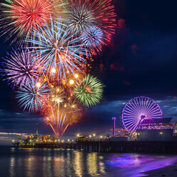 Multicolored firework display in night sky on waterfront, Los Angeles, California, USA - ISF11952