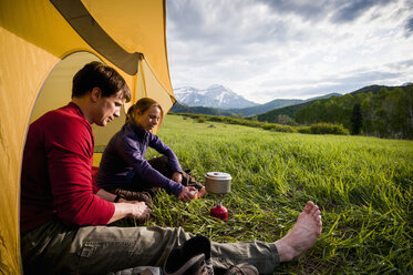 Campers on backpacking trip hanging out, Uinta National Forest, Wasatch Mountains, Utah, USA - ISF12005