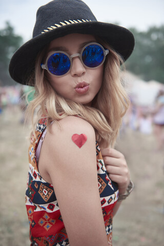Portrait of hipster woman at the music festival stock photo