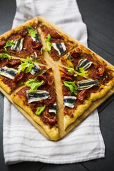 Pizza Marinara garnished with anchovies and parsley - GIOF03977