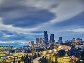 Traffic light trails and cityscape at dusk, Seattle, Washington State, USA - ISF13013