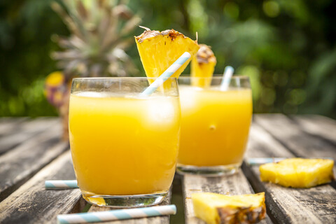 Two glasses of Pineapple Champage Cocktail stock photo