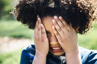 Close up portrait of girl covering face with hands - ISF13065