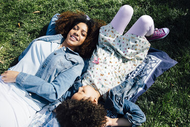 High angle view of mother and daughter lying side by side on backs, eyes closed - ISF13066