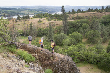 Small group of people hiking along ridge, elevated view - ISF13193