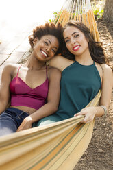 Young women relaxing in hammock - ISF13585