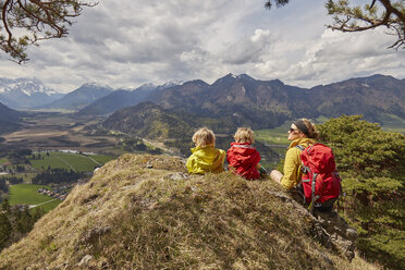 Mother and sons, looking at mountain view, Garmisch-Partenkirchen, Bavaria, Germany - ISF13673