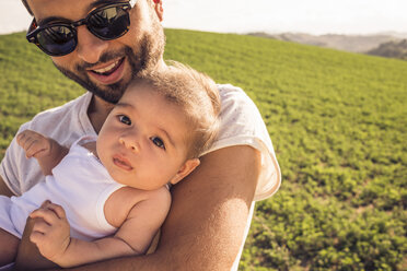 Portrait of baby girl and proud father - CUF33494