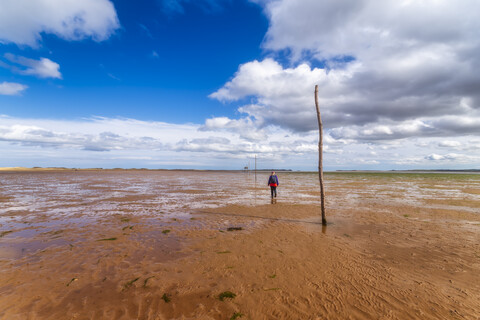 United Kingdom, Northumberland, posts marking the pilgrims' way crossing to Lindisfarne stock photo