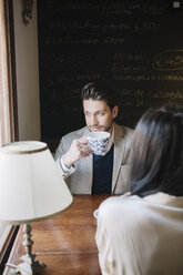 Elegant couple in a cafe - ALBF00549