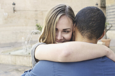 Close up of tourist couple hugging, Valencia, Spain - CUF33998