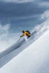 Mid adult male skier speeding downhill, Obergurgl, Austria - CUF34077