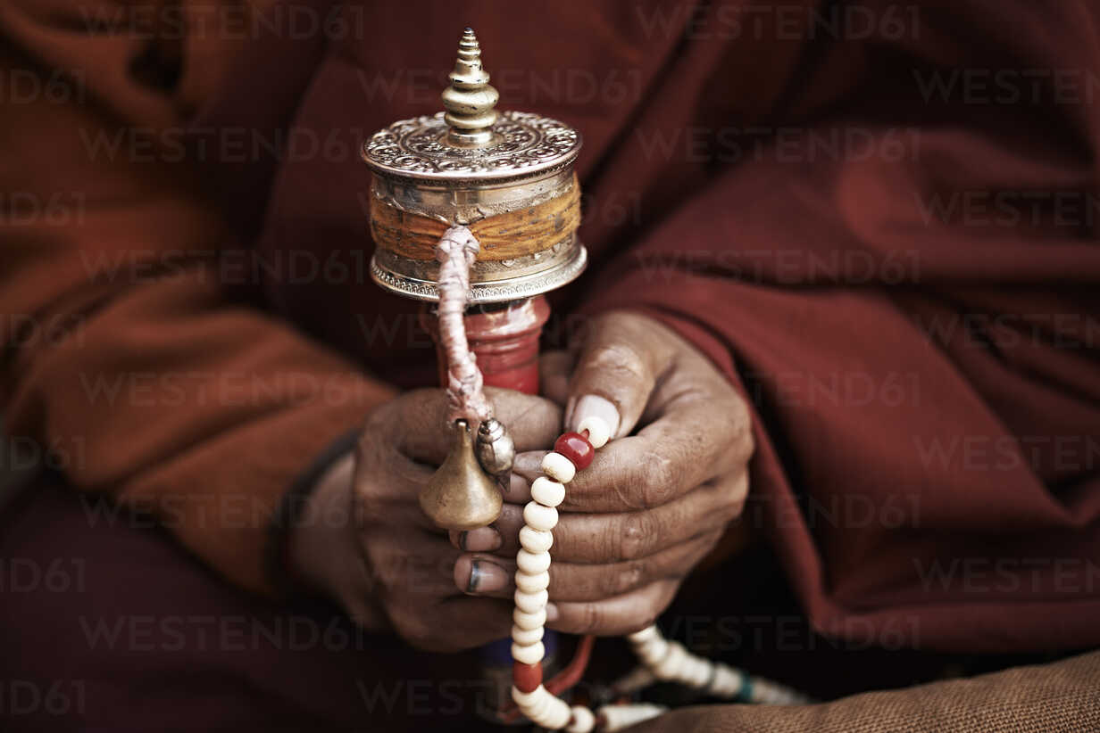 Close up of buddhist monks hands holding prayer beads, Thamel, Kathmandu,  Nepal stock photo