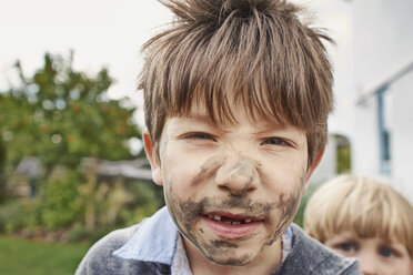 Boy with muddy face - CUF34453