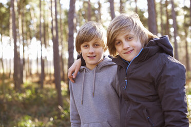 Portrait of twin brothers in forest - CUF34642