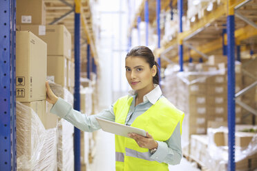 Female warehouse worker with digital tablet - CUF35010
