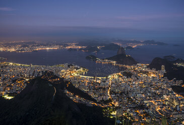Distant view of Rio De Janeiro coastline at night, Brazil - CUF35668