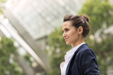 Young businesswoman at Broadgate Tower, London, UK - CUF35719