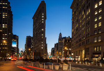 Street view of New York with Flat Iron Building in view - CUF35866