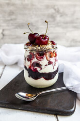 Glass of natural yoghurt with cherries, cherry jam and granola - SARF03817