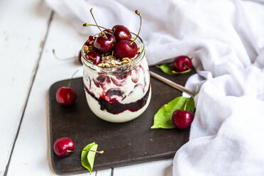 Glass of natural yoghurt with cherries, cherry jam and granola - SARF03819