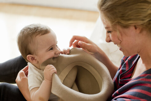 Mother playing with baby boy - CUF36884