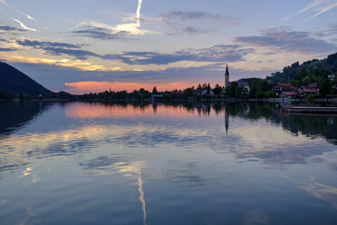 Germany, Bavaria, Upper Bavaria, Lake Schliersee, Schliersee with Parish Church St. Sixtus at sunset - LBF01976