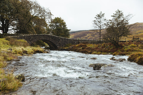 United Kingdom, England, Cumbria, Lake District, stone bridge over the river Duddon stock photo