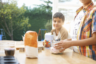 Children baking in kitchen - CUF38005