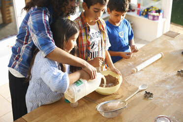 Mother and children baking in kitchen - CUF38018