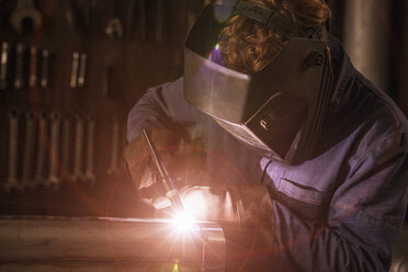 Welder soldering iron in workshop - CUF38063