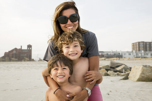 Portrait of mother and two boys, Long Beach, New York State, USA - ISF15194