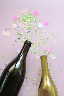 Stillife with champagne and wine bottle and confetti - HSTF00061